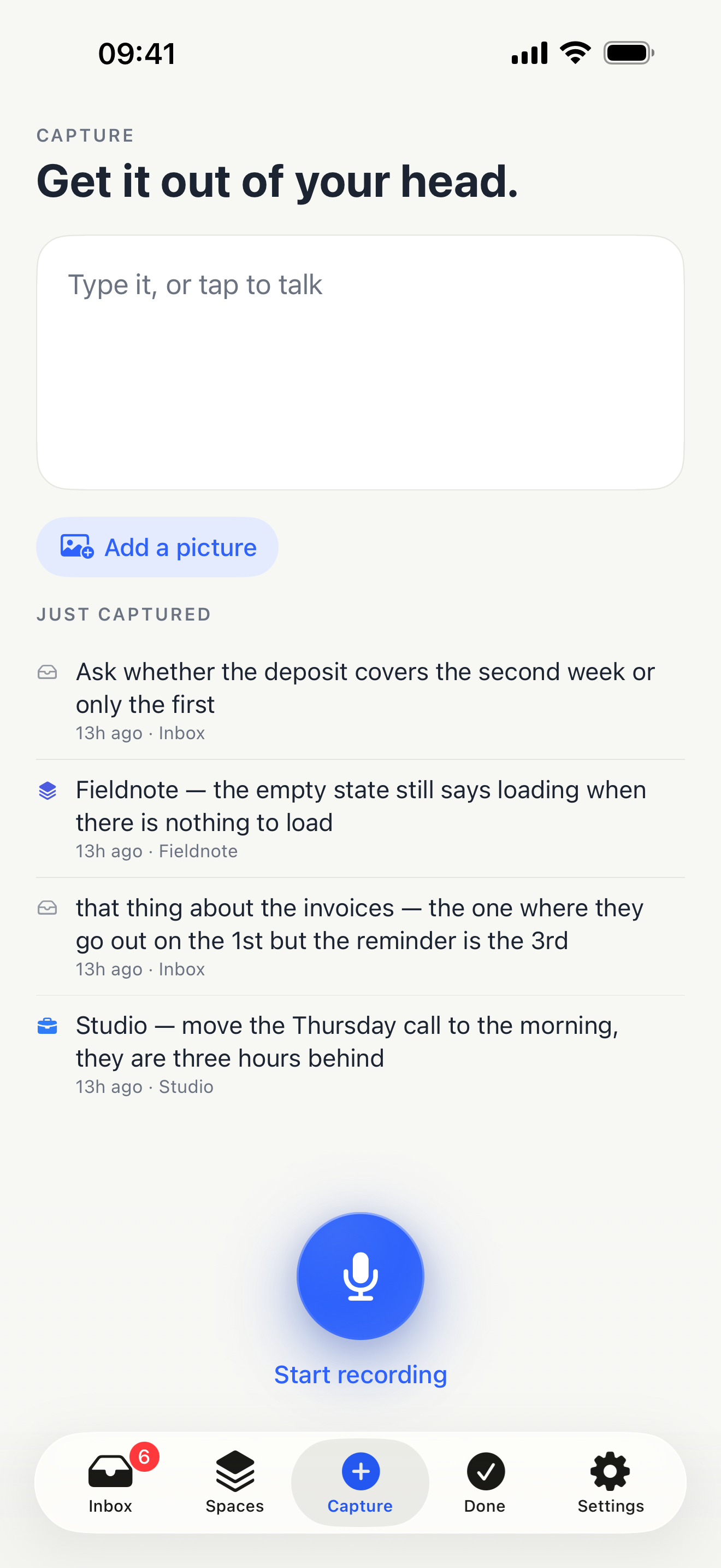 The capture screen: a writing box, a list of what was just captured, and one large record button.