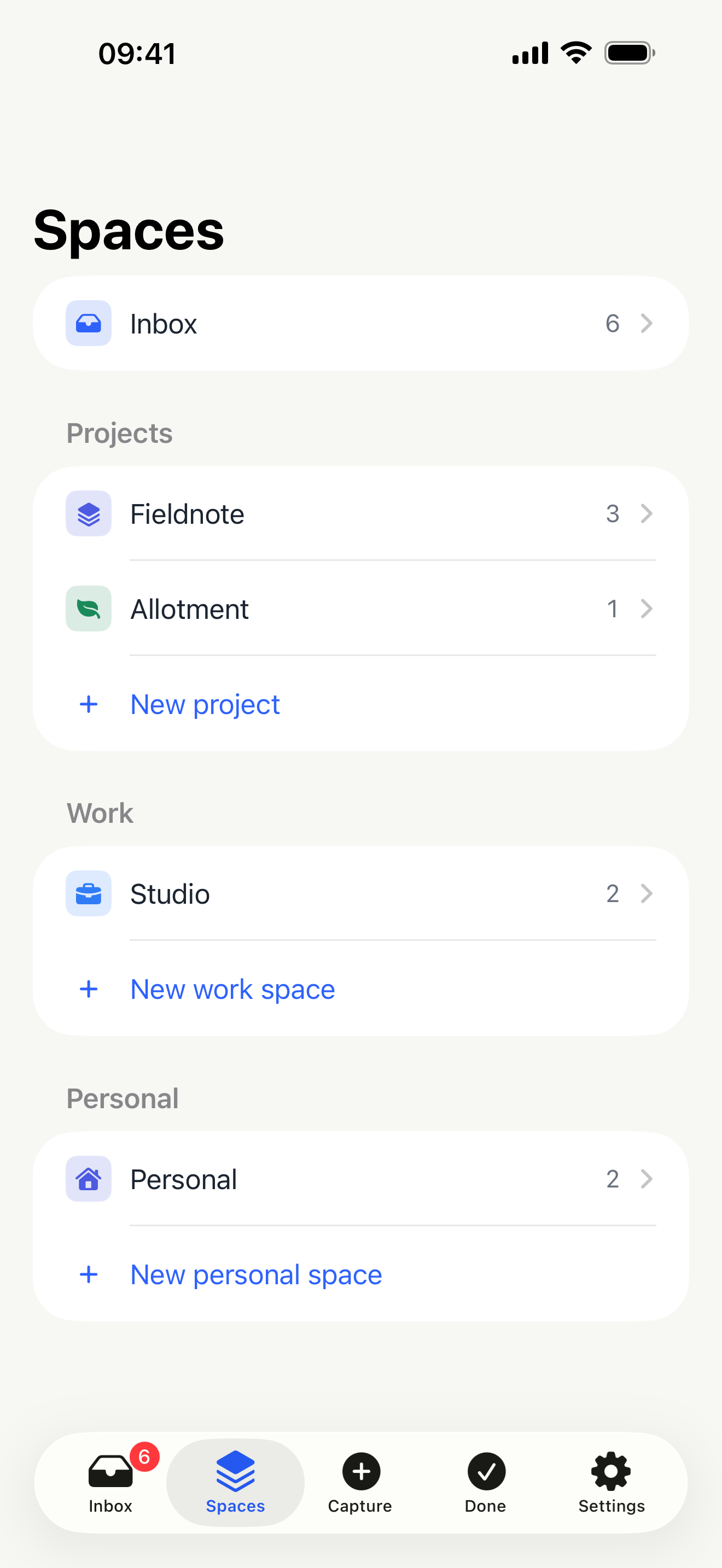 The Spaces screen: projects grouped into Projects, Work and Personal, each with its own icon.
